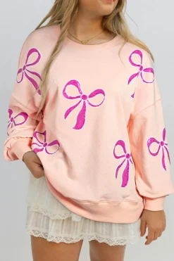Discount Dear-Lover Sequined Bowknot Drop Shoulder Oversized Sweatshirt Apricot Pink