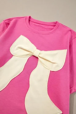 Fashion Dear-Lover Contrasting Color Ribbon Bow Front Patch Loose Tee with Slits Strawberry Pink